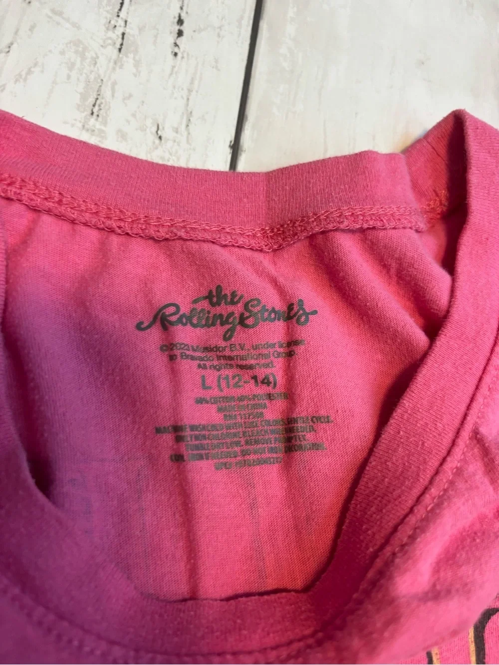 the Rolling Stones Pink Graphic Tee with Red Tongue Logo